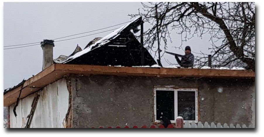 ..Irinel's family with burnt house